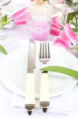 Table setting with spring flowers close up