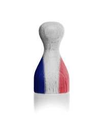 Wooden pawn with a painting of a flag