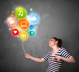 Woman holding social media balloon