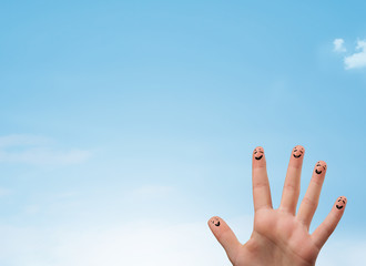 Happy smiley fingers looking at clear blue sky copyspace