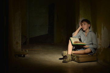 little boy with book