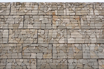 Hintergrund Mauer aus Gabionen