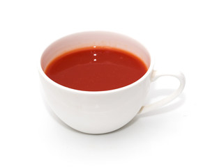 tomato juice in glass on white background