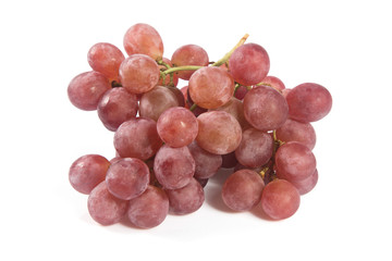 red grapes over white background.