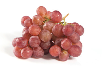 red grapes over white background.