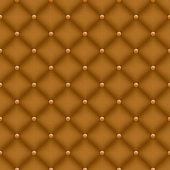 Seamless mustard color quilted background with golden pins.
