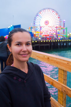 Smiling woman at amusement park