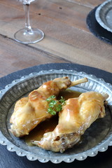 Braised rabbit legs