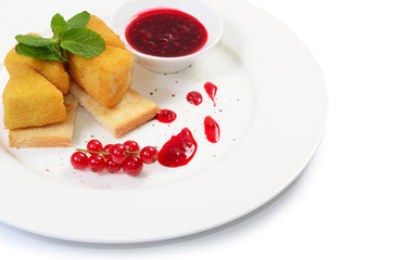 Cheese in breadcrumbs with currant jam