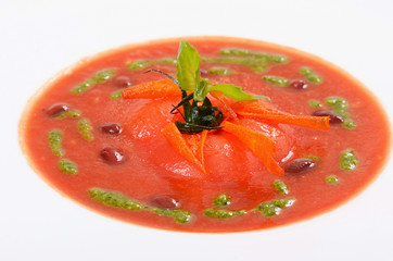 Soup from baked tomatoes with pesto