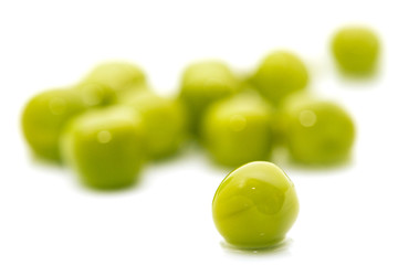 green peas on a white background. macro