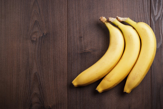banana on the brown wooden background
