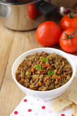 Vegan dinner - green lentils with vegetables