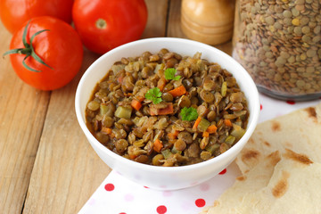 Vegan dinner - green lentils with vegetables