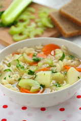 Healthy vegan soup with celery and vegetables