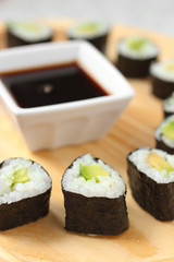 Vegan rolls with avocado and soy sauce