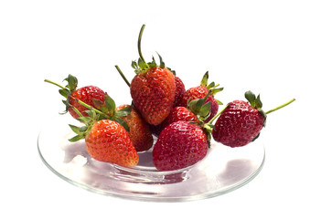 strawberries on glass plate