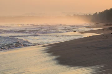 Fototapeten Sunrise on deserted beaches and coastline © piccaya