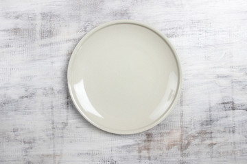Top view empty plate on rustic wooden table