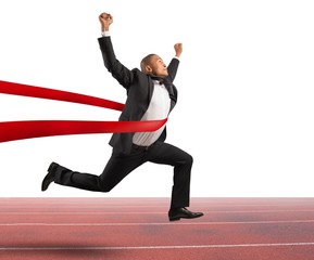 Successful businessman in a finishing line
