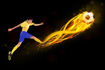 Fototapeta na wymiar Soccer player kicking the ball