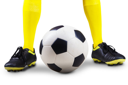 Soccer ball with player feet