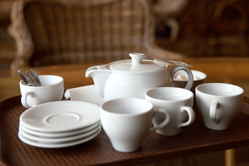 White tea set on table