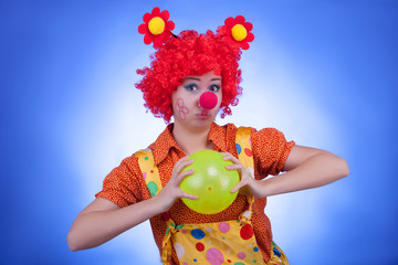Happy clown on blue background