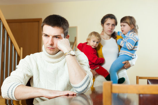 Family with two children having quarrel at home