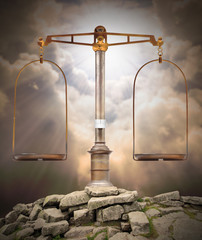 Weight scale on the peak. Divine justice concept.