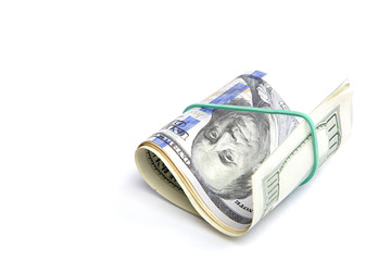 Roll of banknotes on a white background.