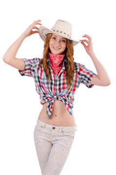 Joyful redhead cowgirl isolated on white