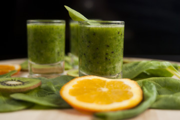 fresh green smoothie with spinach and kiwi