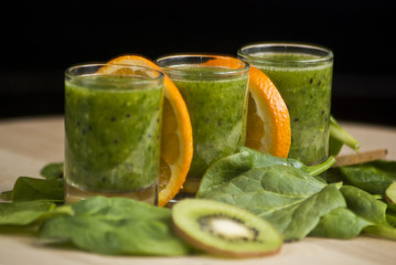 fresh green smoothie with spinach and kiwi