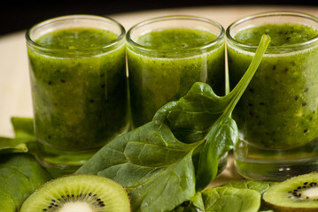 fresh green smoothie with spinach and kiwi