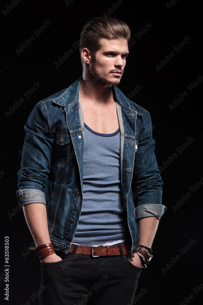 Canvas Prints young fashion man in casual jeans clothes looking away