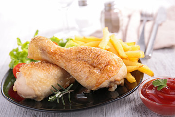 roast chicken leg and fries