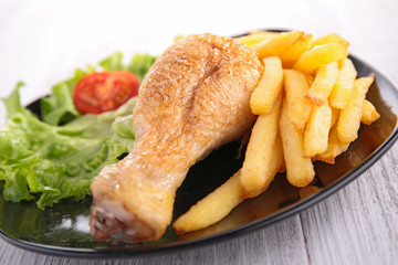 chicken leg and fries