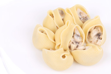 pasta shells on stuffed with mushrooms