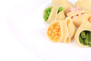 pasta shells stuffed with vegetables and sausage