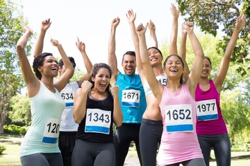 Friends cheering after winning a race