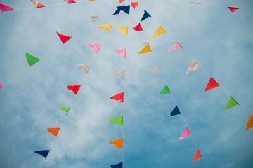 Obraz premium Colorful flag with blue sky