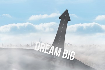 Fototapeta premium Dream big against road turning into arrow