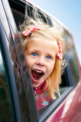 little girl admiring looks of the car