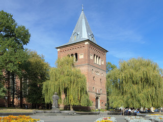 Bell tower and monument of Yuriy Drohobych in Drohobych, Ukraine - obrazy, fototapety, plakaty