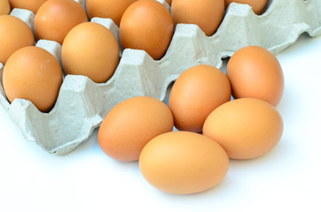 the brown eggs in egg box