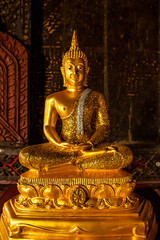 Fototapeta premium Image of Golden buddha statue