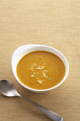 yellow curry and crab in cup and spoon