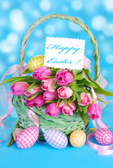 easter basket with tulips and eggs