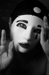 a portrait with Pierrot mask with tears
